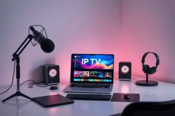 A content creator's modern desk with a laptop showing a vibrant IPTV interface, professional microphone, and cinematic lighting.
